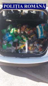 Prins cu alimentele furate în portbagajul mașinii
